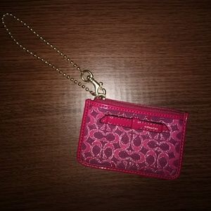 Pink, Purple, and Gold Coach ID Wristlet